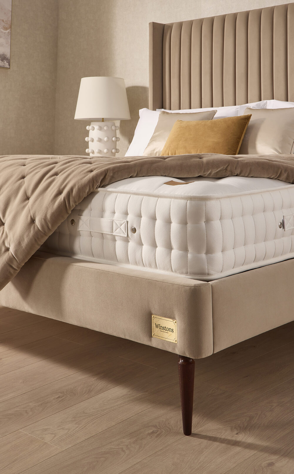 Henley luxury bed frame with tall panelled headboard and Artisan mattress from www.winstonsbeds.com/en-us