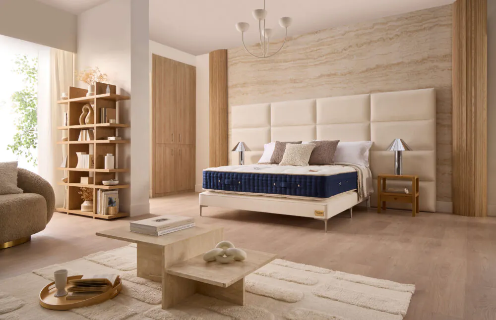 Winstons Grand Luxe mattress with navy side panels and white hand-tufted top from www.winstonsbeds.com/en-us