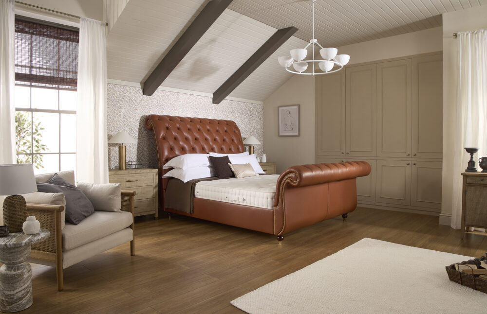 Traditional Herald leather bed featuring a Chesterfield-style headboard and footboard | www.winstonsbeds.com