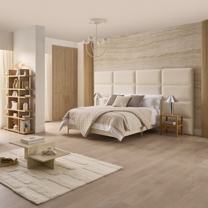 Forge upholstered bed with a large padded panelled headboard in a contemporary bedroom | www.winstonsbeds.com
